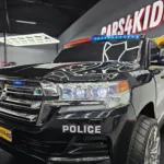 Elektrische kinderauto Toyota Land Cruiser Politie